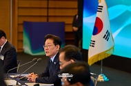 이재명 대통령이 10월 7일 서울 한 회의장에서 열린 한국형 녹색대전환(K-GX) 전략 국민보고회에서 발언하고 있다.