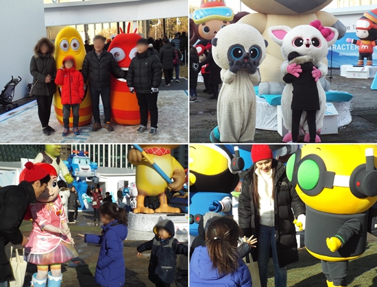 (좌측 상단부터 시계 방향) 옐로우와 레드(라바)와 함께 사진을 찍는 가족. 유후와 패미(유후와 친구들)를 안는 학생. 루비(레인보우 루비)와 시그널(타오르지마 버스터)와 가위바위보 게임을 하는 아이들.