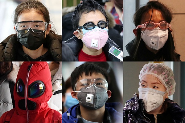 신종 코로나바이러스 감염증 공포가 확산되면서 지난달 29일 인천국제공항 1터미널에서 중국 각지에서 온 여행객들이 감염 예방을 위해 산업용 마스크, 물안경, 헤어캡 등을 쓰고 입국하고 있다. (저작권자(c) 연합뉴스, 무단 전재-재배포 금지)